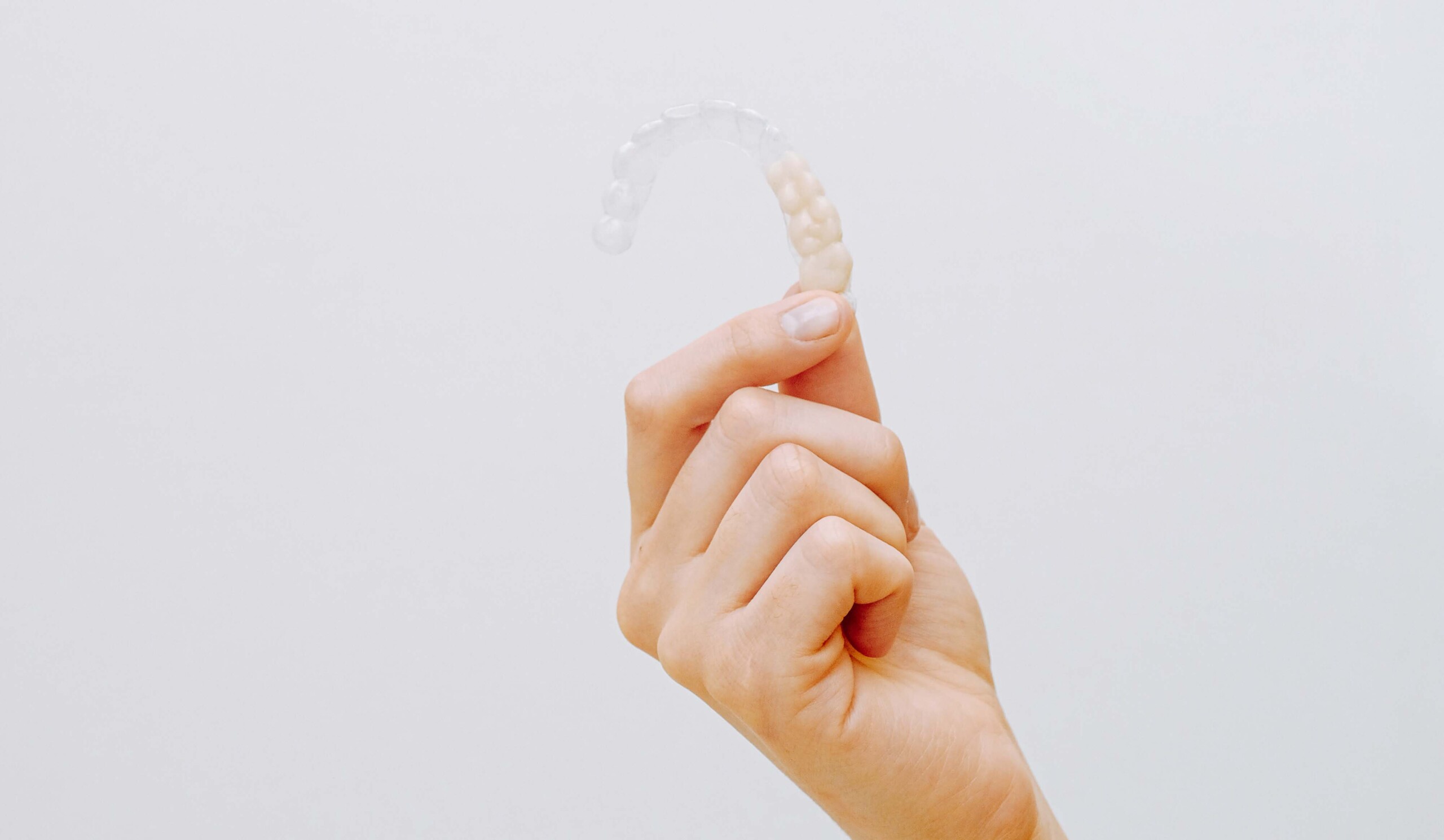 Dos & Don’ts To Keep Your Invisalign In Shape - District Dentistry