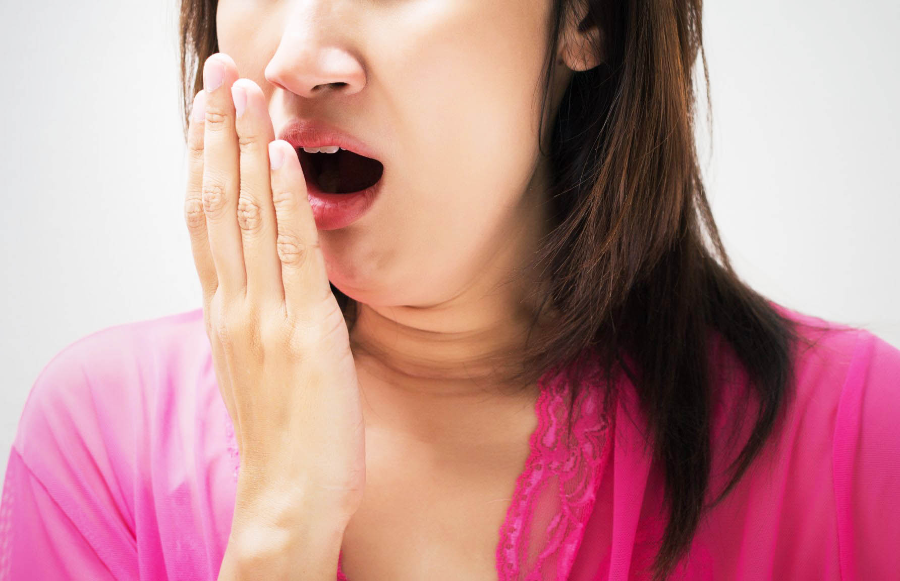 Tips To Help You Get Rid Of Bad Breath - District Dentistry